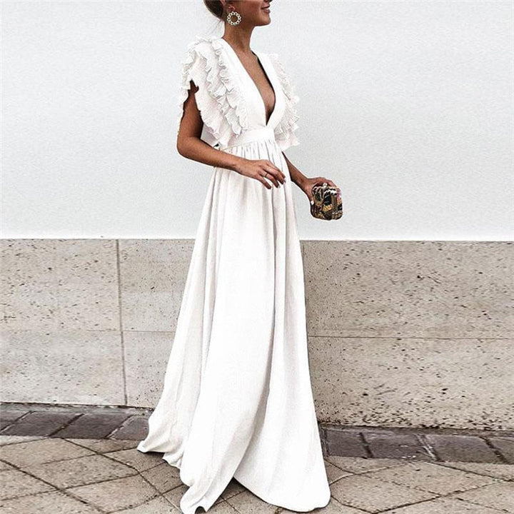 Chic women's long summer dress. This elegant flowy maxi dress combines comfort with modern fashion.