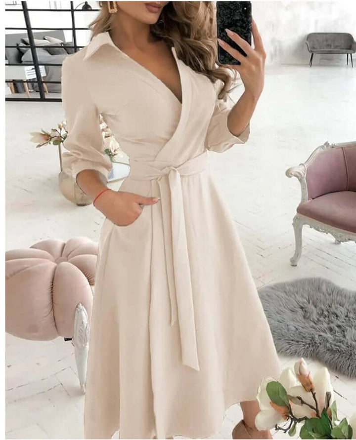 Versatile women's wrap midi cocktail dress. Collared, tie-waist A-line for elegant party & evening wear.