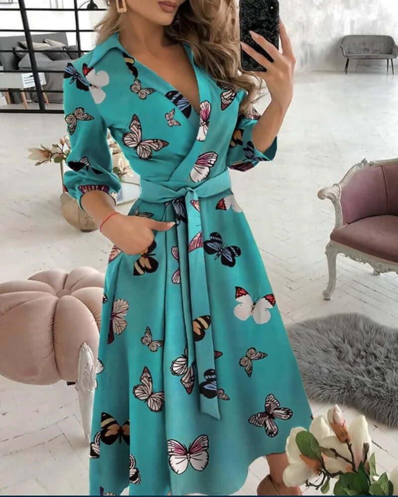 Women's elegant wrap midi dress. Features a stylish collar & tie waist, perfect as a versatile cocktail dress.