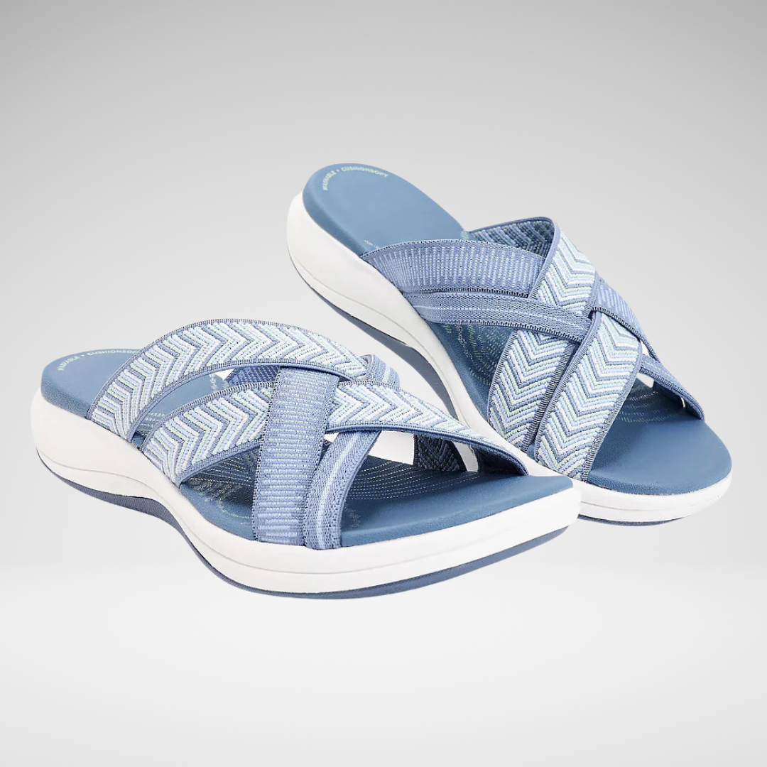 Women's sophisticated cushioned cross-strap comfort sandals for everyday wear.