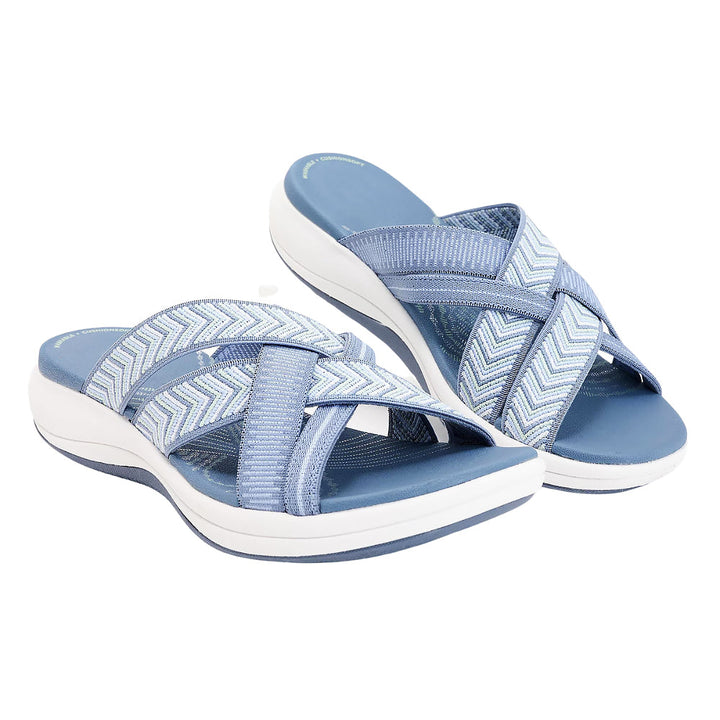 Sophisticated women's comfort sandals with soft cushioned cross-straps, great for casual days.