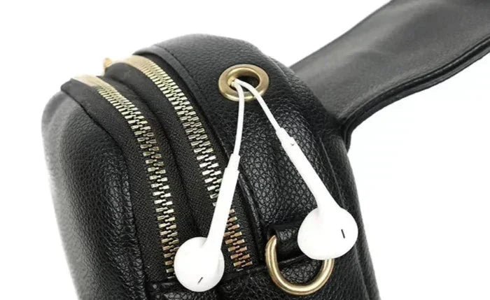 Adjustable strap on a women's vintage style genuine leather shoulder bag.