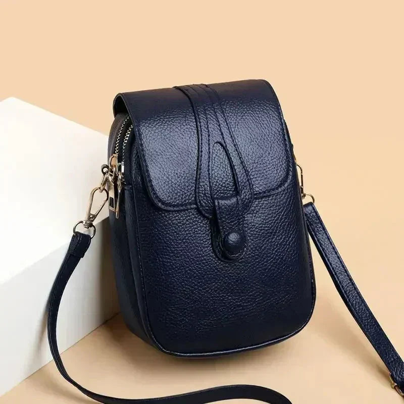 Side view of a classic women's genuine leather shoulder bag, elegant retro accessory.