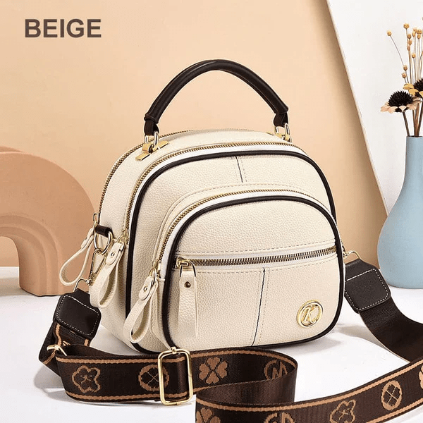 Elegant women's leather shoulder bag with adjustable strap and polished hardware, a chic and durable fashion accessory.