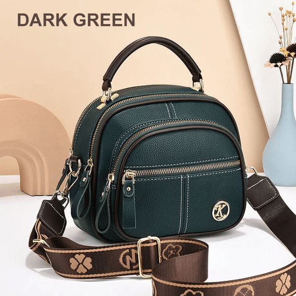 Stylish woman carrying a versatile leather shoulder bag, an essential chic handbag for a modern look.