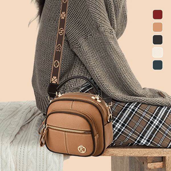 Women's chic black leather shoulder bag with a versatile design, perfect for everyday use and classic style.