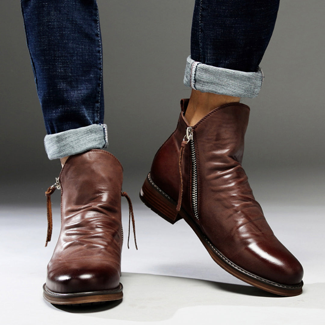 Durable men's work boots with easy ankle zip closure.