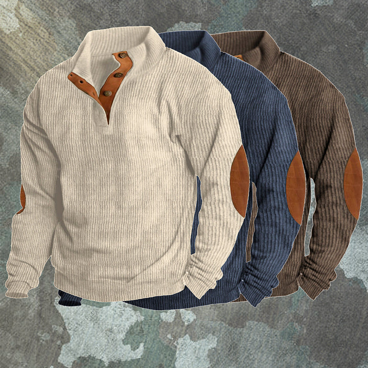 The Asher Outdoor Sweater folded, showing its soft material and thickness for warmth.