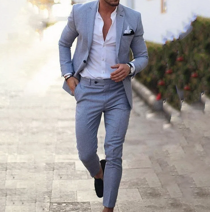 Stylish men's two-piece business casual suit. Blazer and trousers for a modern professional look and men's style.