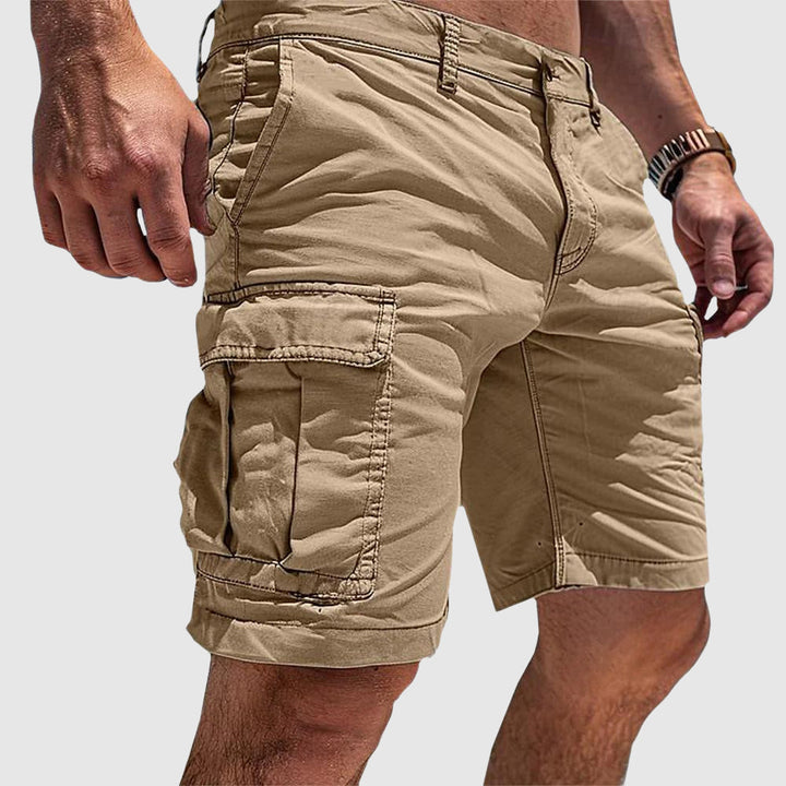Durable men's cargo shorts for outdoor apparel, offering practical storage & relaxed fit for summer activities.