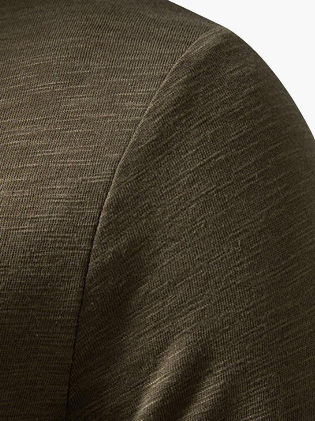 Man wearing a versatile long sleeve henley tee for a casual look.