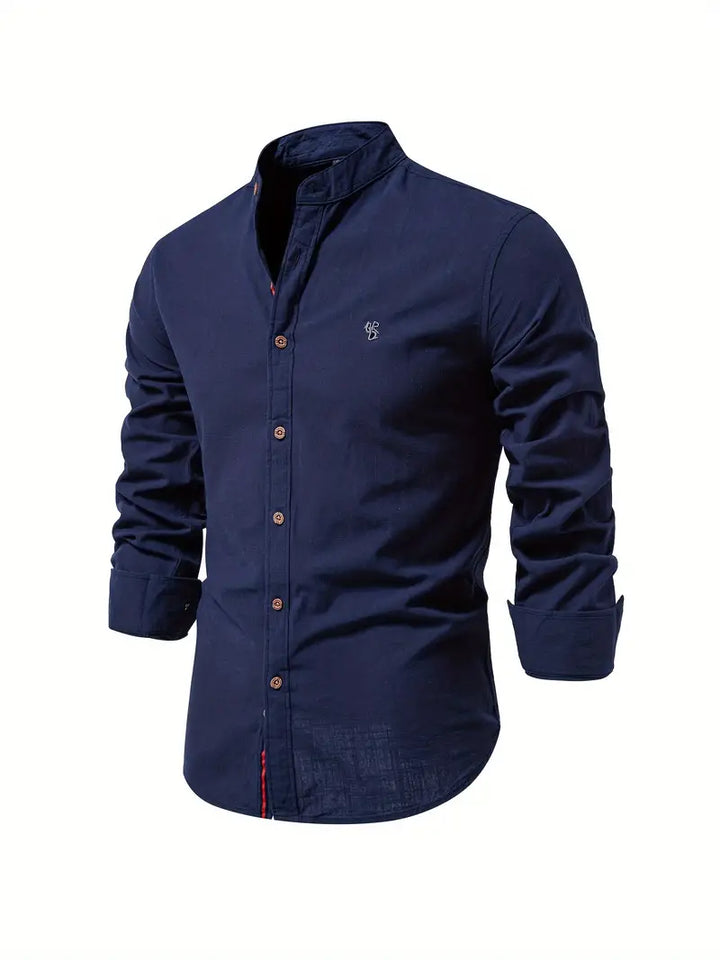 Regular fit men's button-up long sleeve shirt in solid color, essential for everyday casual fashion.
