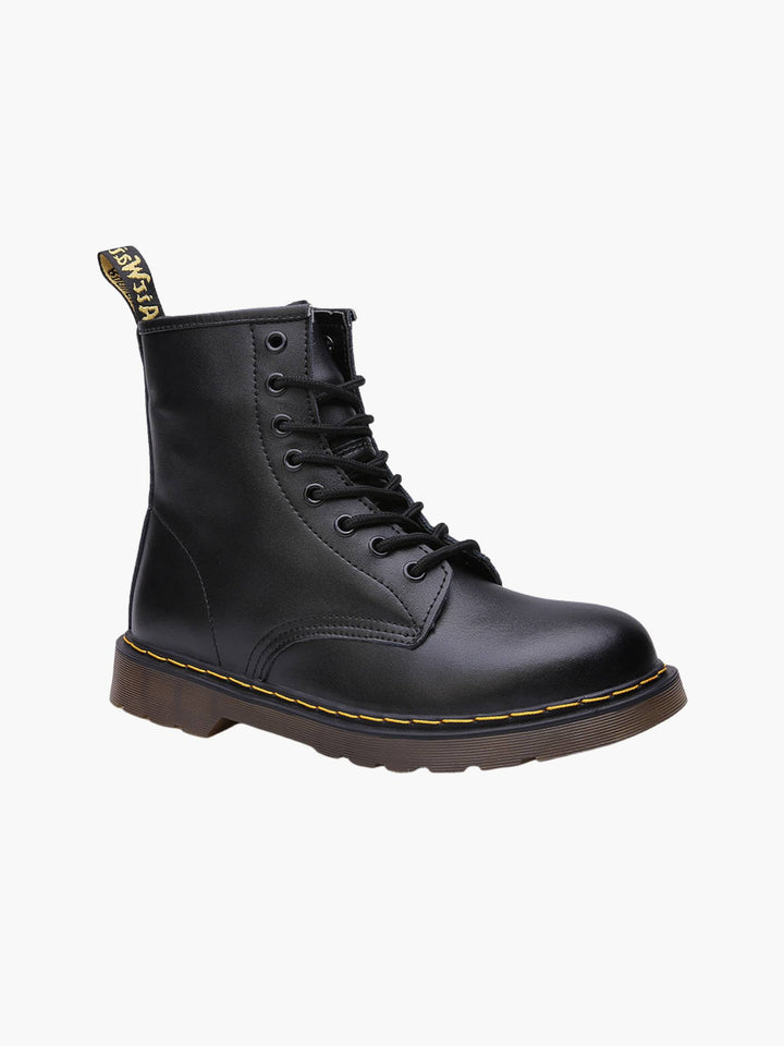 Men's classic black leather Chelsea boots, slip-on ankle footwear for stylish casual wear.