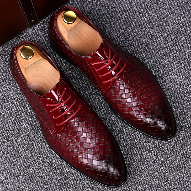 Comfortable and durable men's lace-up leather shoes, versatile for work or events.