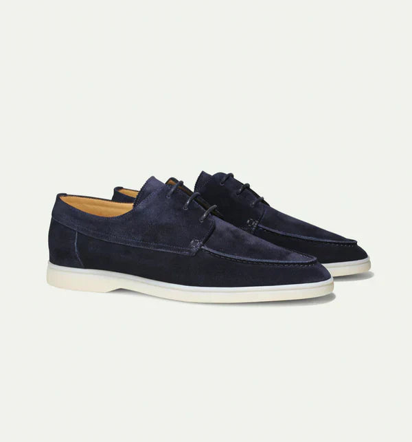 Side profile of smart casual men's leather loafers with secure lace-up closure.