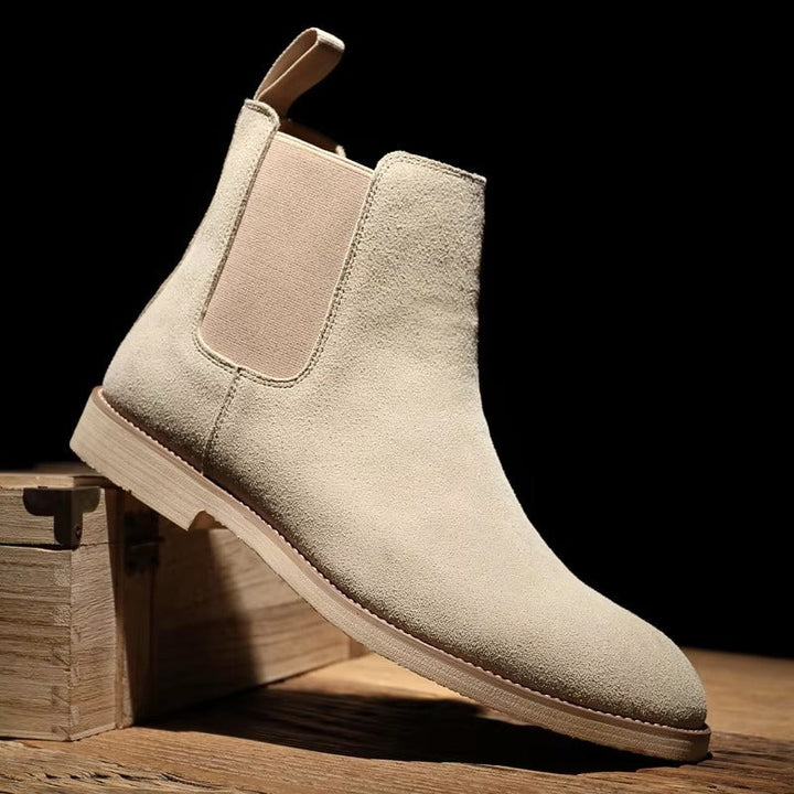 Men's versatile boots: transition from casual to office with these stylish suede-look Chelsea boots.