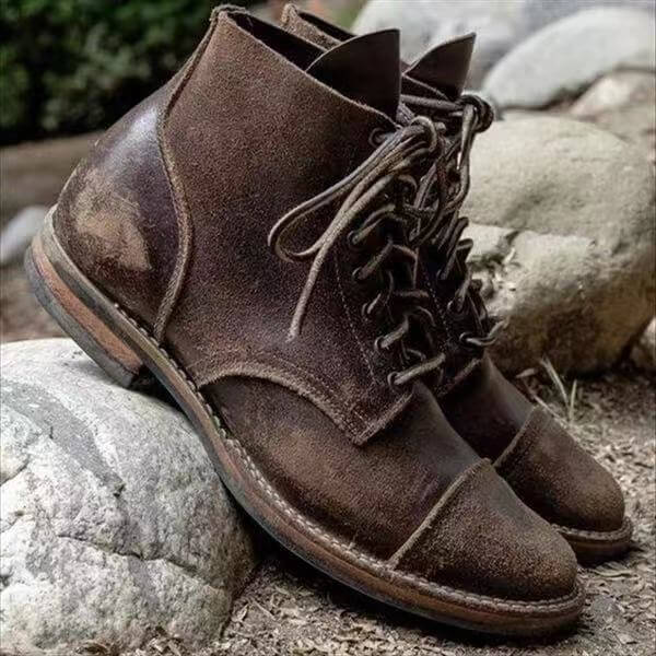Men's classic dark brown leather boots, supportive & versatile for everyday wear.