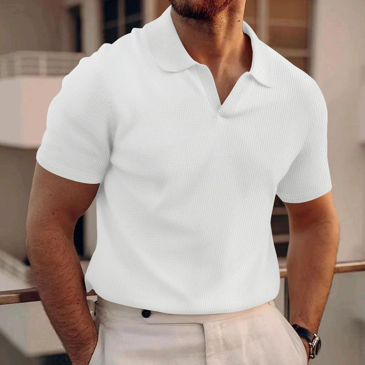 Men's classic fit casual polo shirt in blue, perfect for everyday wear.