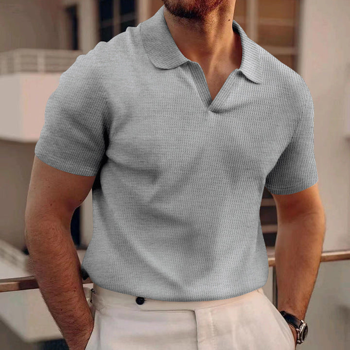 Comfortable fit men's polo shirt, ideal for casual outings and travel.