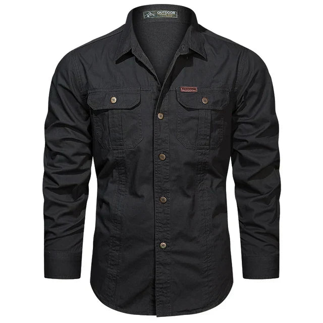 Man wearing a dark green long-sleeve cargo shirt, perfect for outdoor and workwear.
