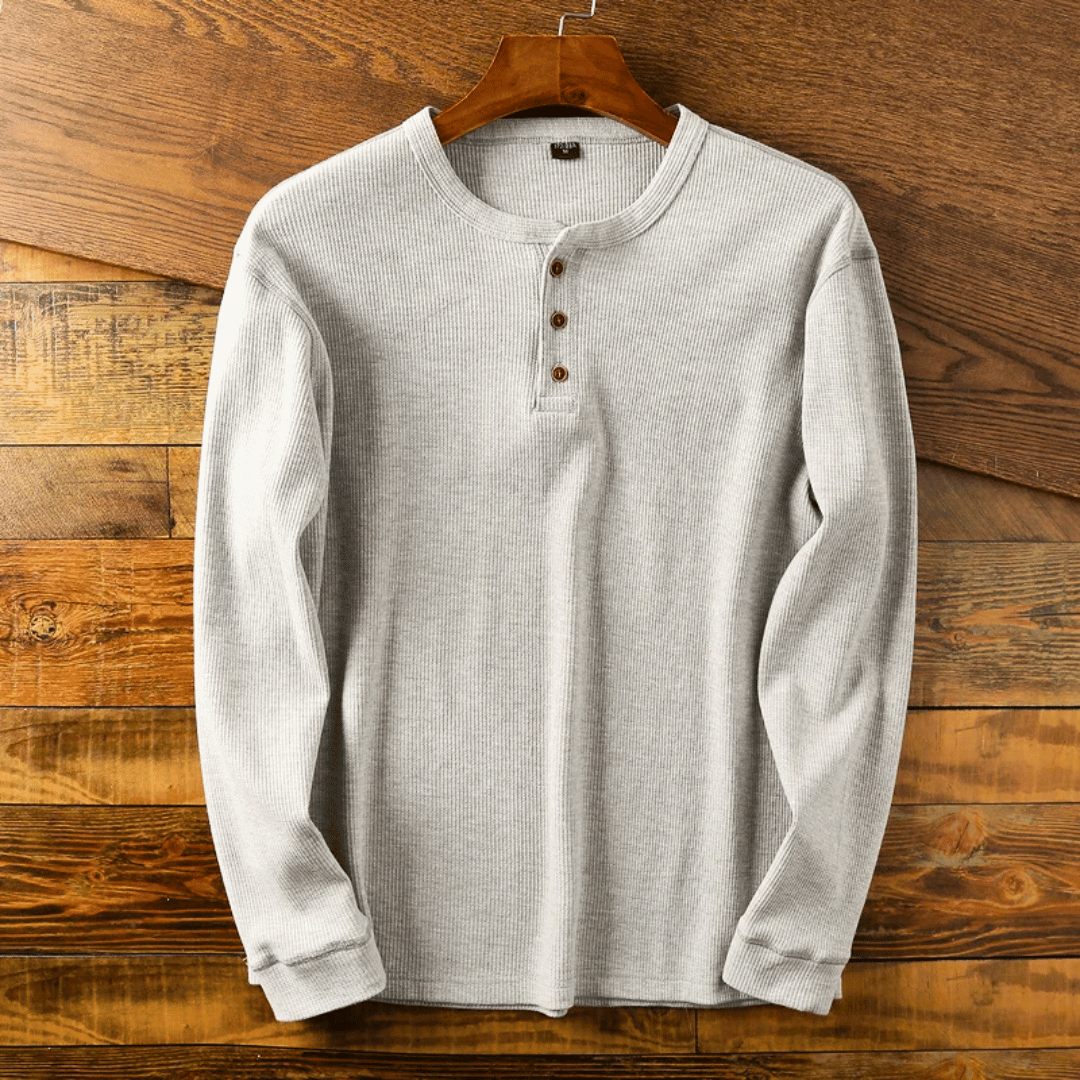 Men's classic henley neck t-shirt in a soft cotton blend, perfect for casual wear.