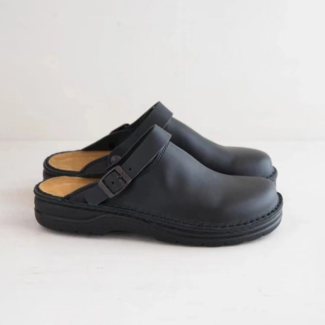 Elegant men's leather house slippers, "Victor", offering classic slip-on style & comfort for indoor & outdoor use.
