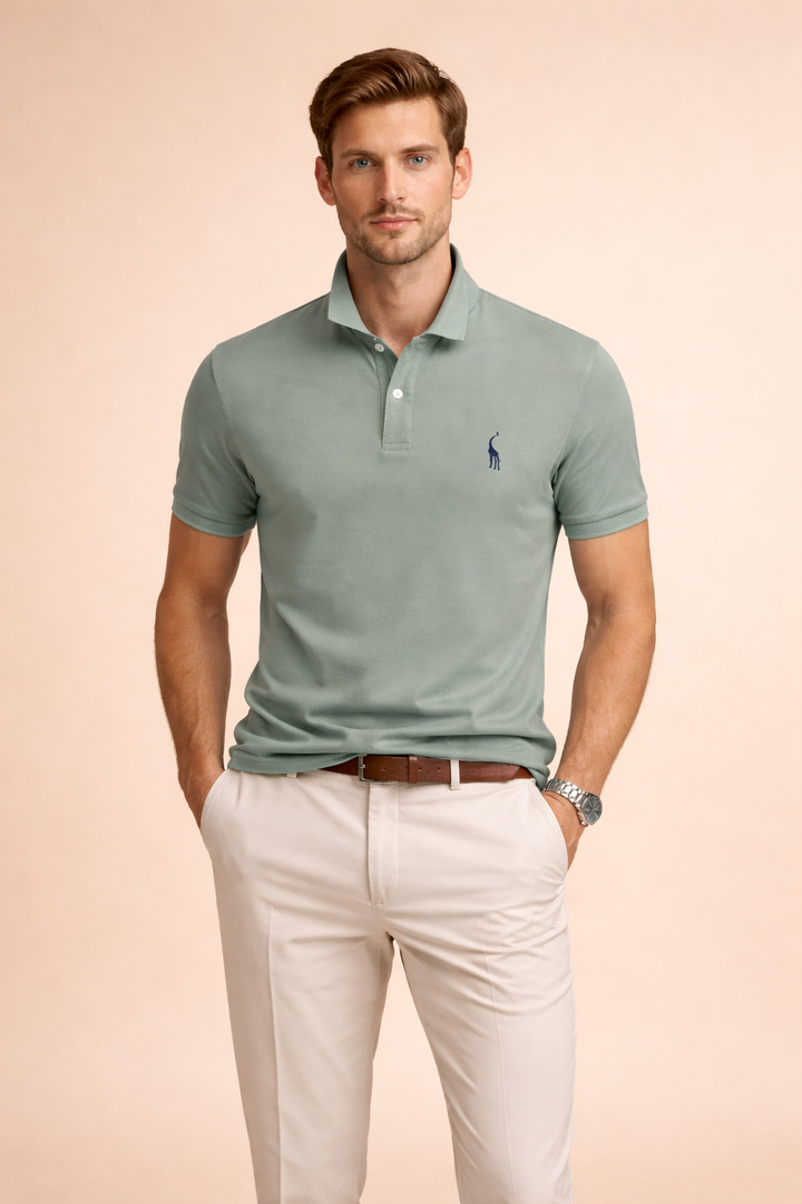 Model posing in a men's smart casual collared polo shirt, emphasizing its timeless style and versatility.