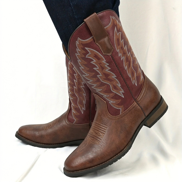 Classic men's mid-calf cowboy boots. Rugged Western design, pointed toe for a traditional look.