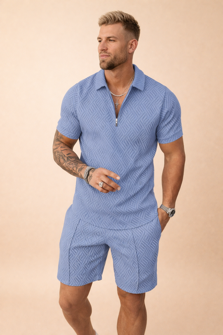 Comfortable and chic men's polo shirt and shorts ensemble for warm weather.