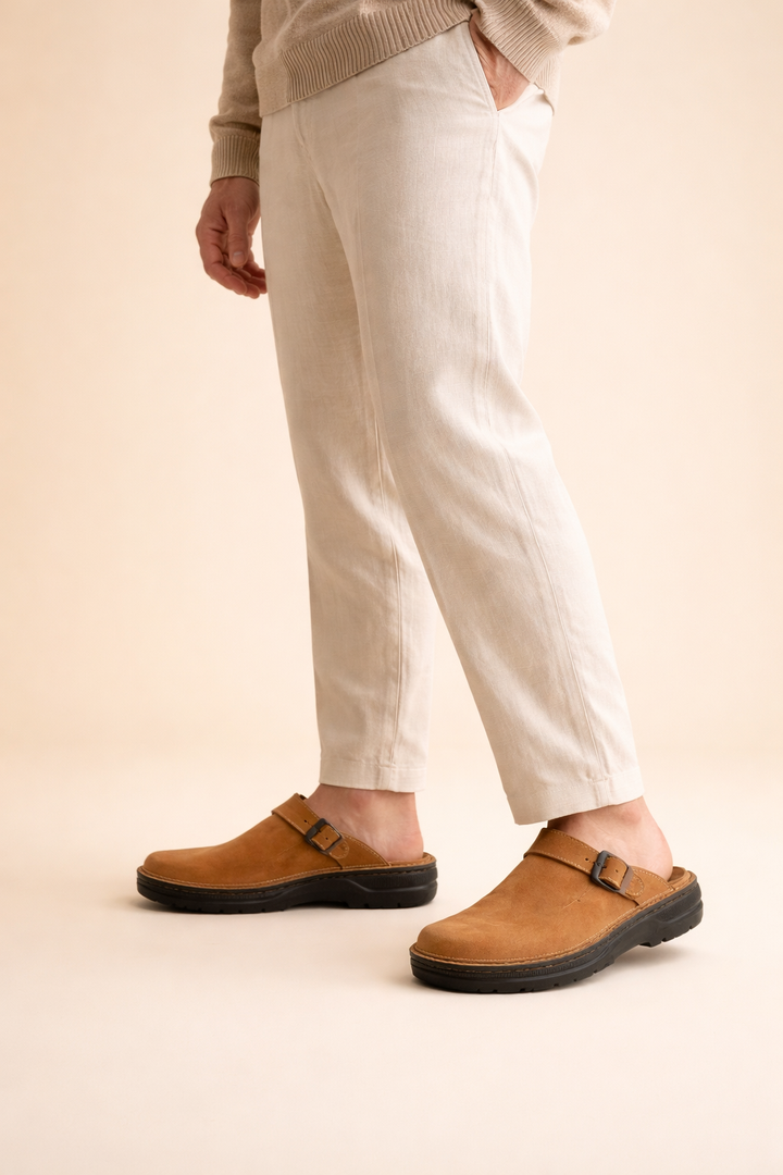 Men's casual footwear: Slip-on clogs with a durable sole and adjustable strap for ultimate comfort.