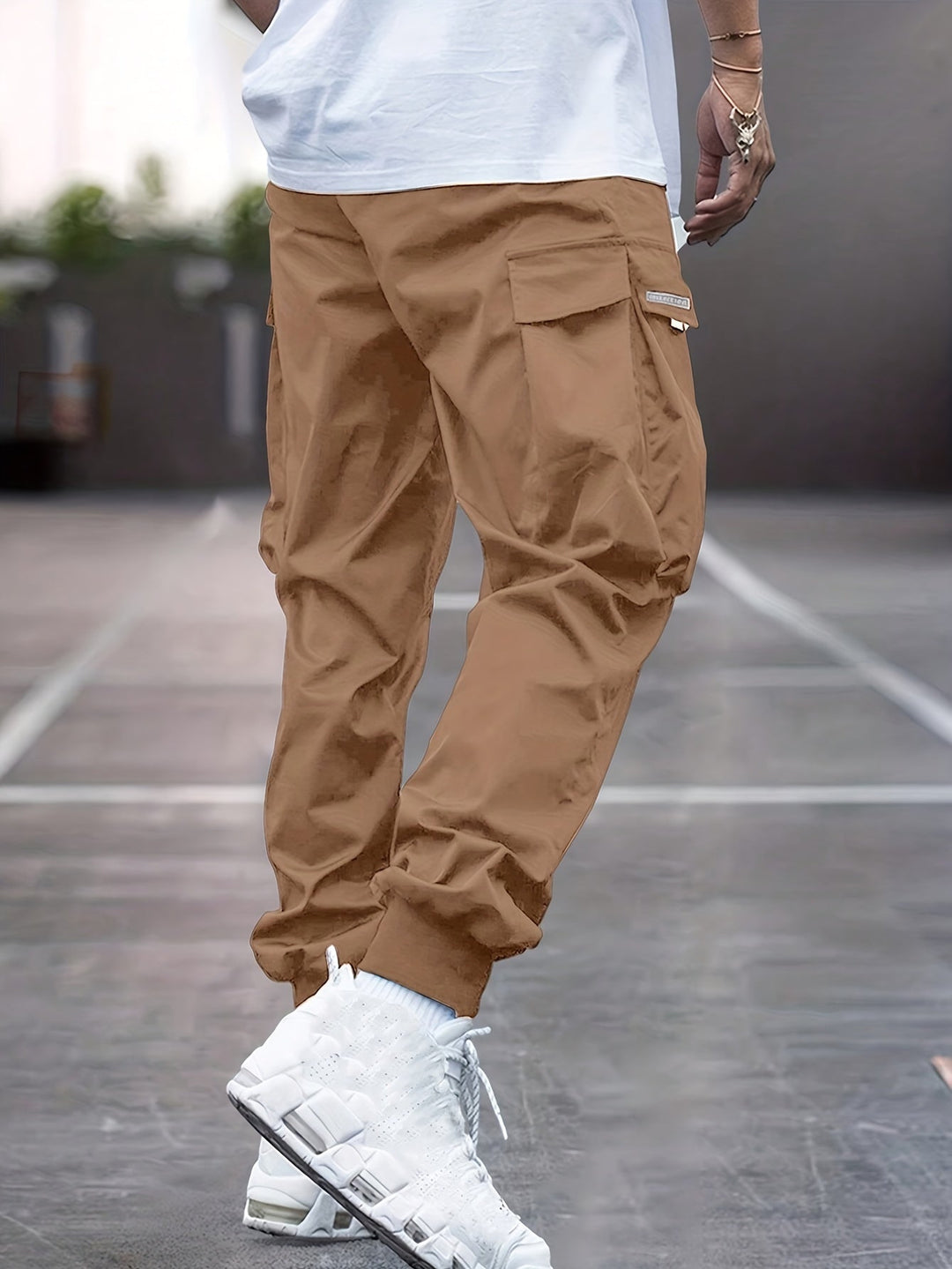 Casual men's drawstring cargo pants, relaxed fit for comfort, utility pockets perfect for everyday & outdoor activities.