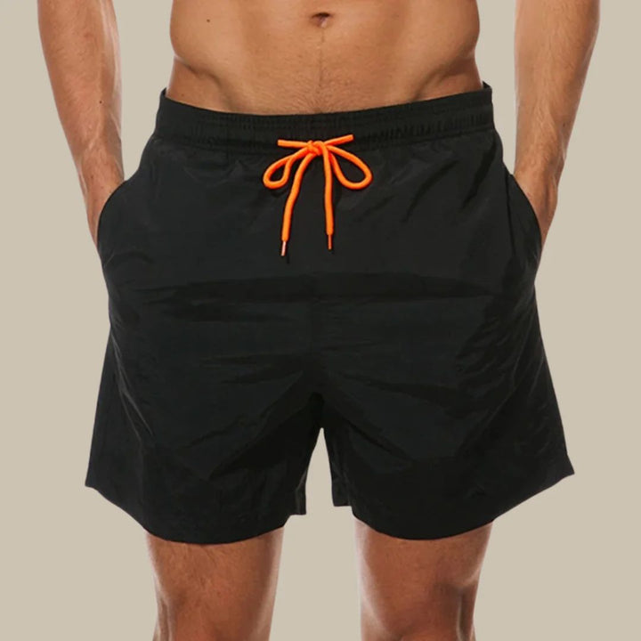 Men's drawstring shorts with side pockets, perfect for swim and casual wear.