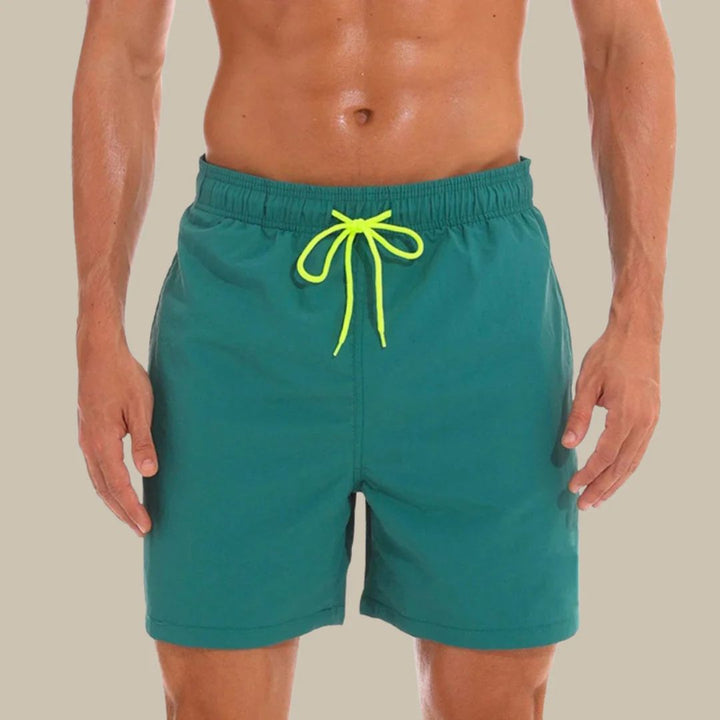Versatile men's athleisure shorts with drawstring and side pockets for active lifestyles.