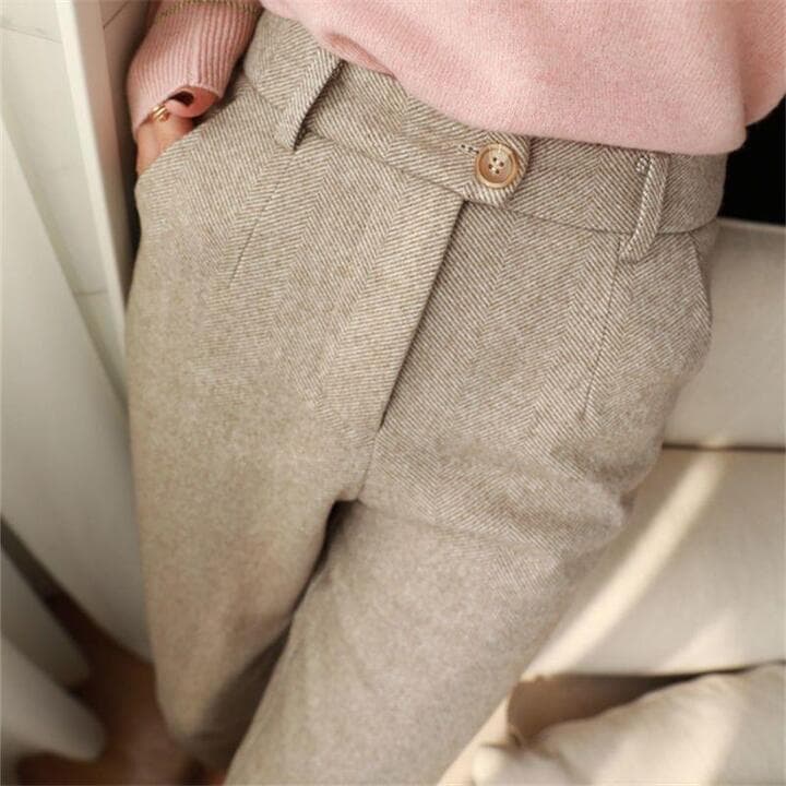 Stylish men's herringbone pleated dress trousers. Versatile for workwear or casual wear.