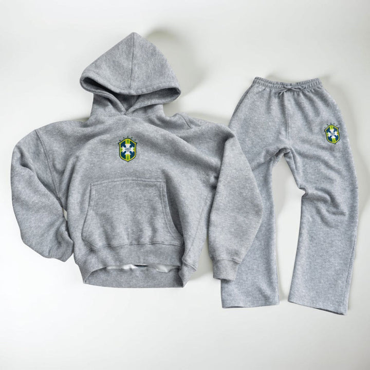 Stylish men's all-in-one tracksuit, versatile for sleep and lounge.
