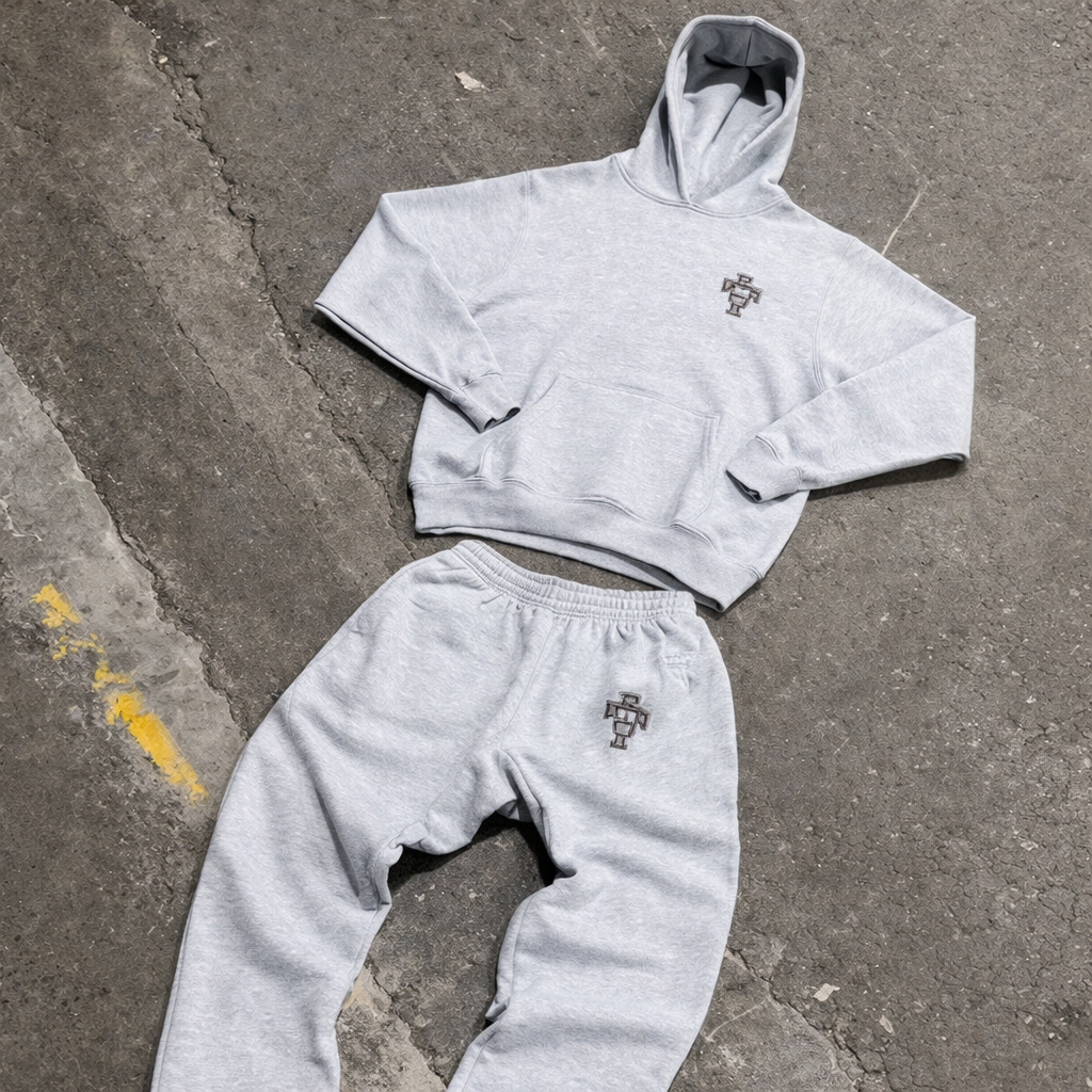 Close-up of the soft, cozy fabric on a men's full body hooded tracksuit.