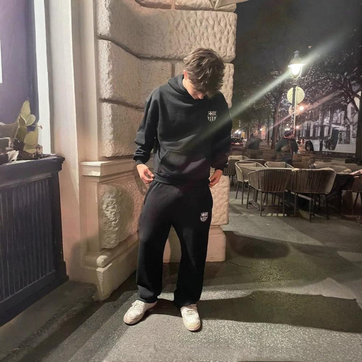 Men's grey hooded tracksuit, designed for comfortable sleepwear and loungewear.