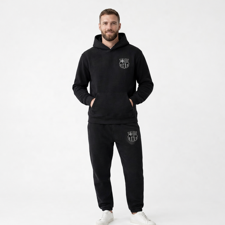 Detail shot of the hood and zipper on a men's comfortable loungewear tracksuit.