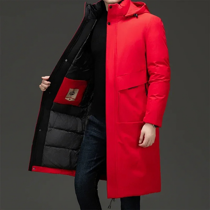 Red men's long insulated hooded winter coat, offering warmth and protection in cold weather.
