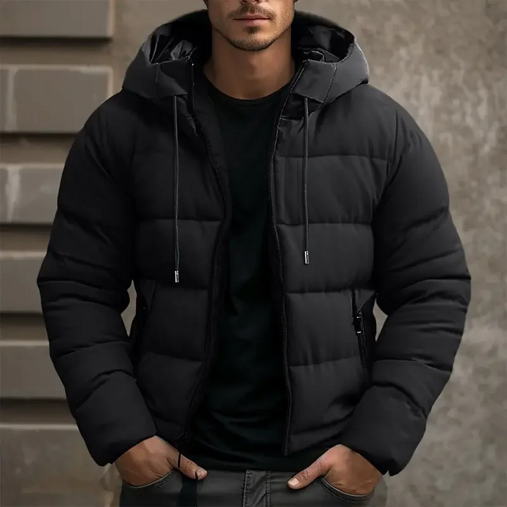 Quilted men's outerwear, a warm hooded puffer jacket designed for cold days.
