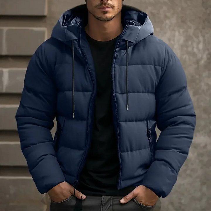 Stylish men's hooded puffer coat, insulated and quilted, perfect for winter warmth.