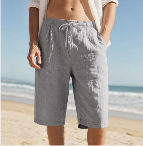 Grey men's pull-on knee-length chino shorts for versatile summer fashion. Comfortable drawstring waist, relaxed fit.