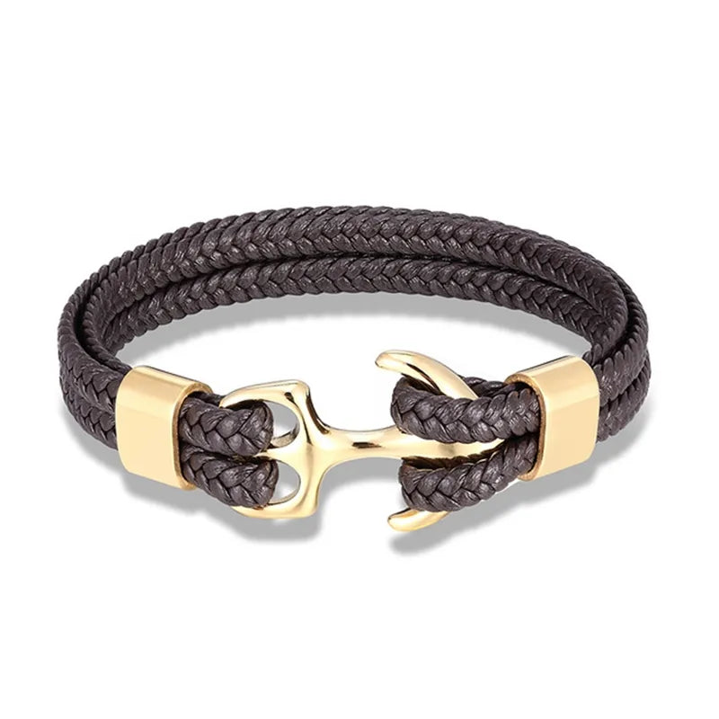 Elegant men's leather bracelet with a polished silver nautical anchor. Fashionable accessory.