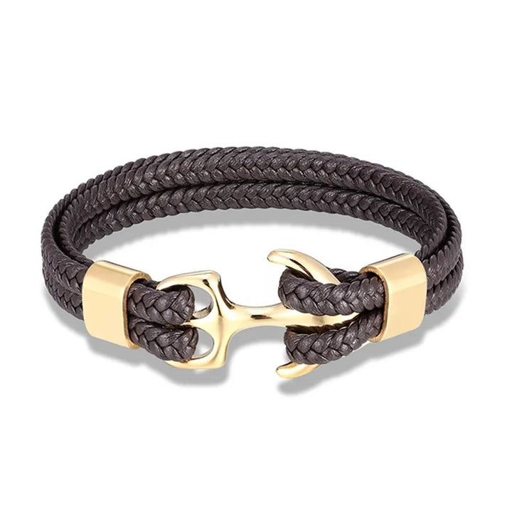 Elegant men's leather bracelet with a polished silver nautical anchor. Fashionable accessory.