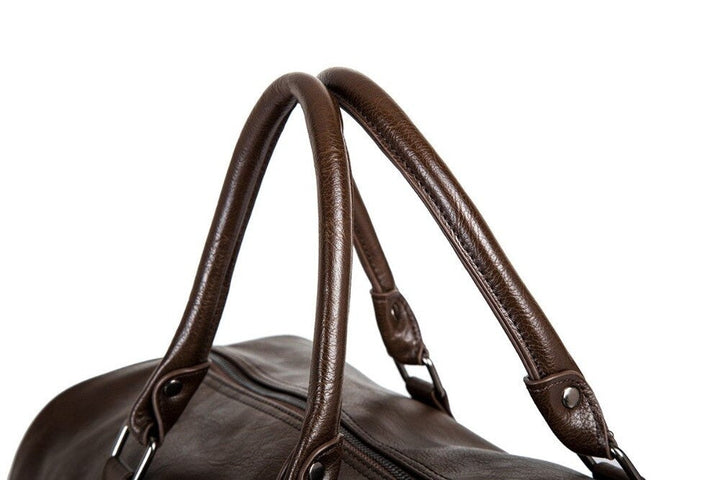 Men's durable leather duffel bag, perfect for business travel.