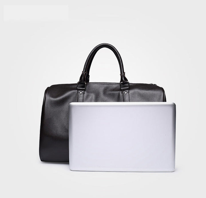 Spacious men's travel duffel bag, crafted from durable leather.