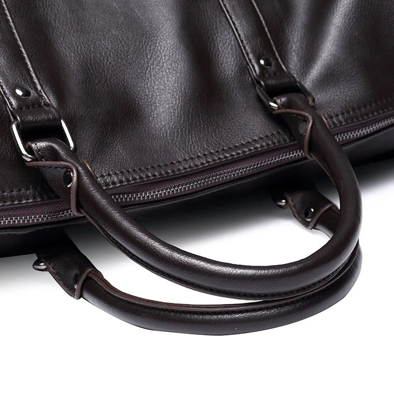 Black leather weekender bag, a durable and stylish travel option.