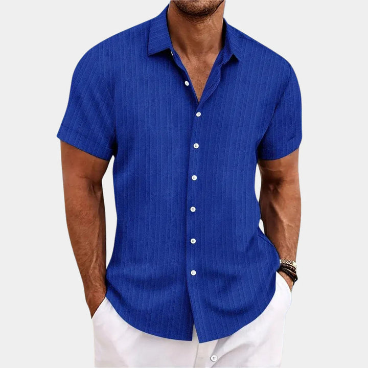 Men's lightweight summer button-down shirt, short sleeve, breathable, relaxed fit for warm weather style.