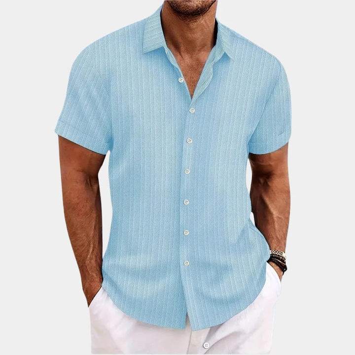 Casual men's button-down shirt, perfect for summer, smart casual look, comfortable & versatile everyday wear.