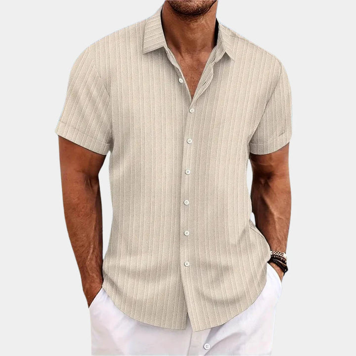 Men's short sleeve button-down, lightweight summer wear, relaxed fit, great for warm weather style & comfort.